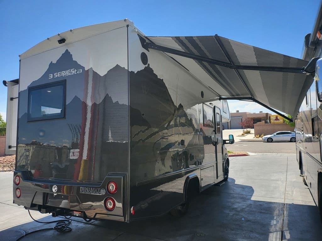 Isata 3 24FW with the 16-foot power awning extended