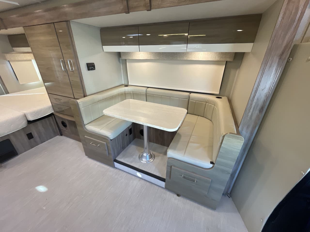 Entegra Coach QWEST 24 U-shaped dinette in the slide-out — converts to another bed