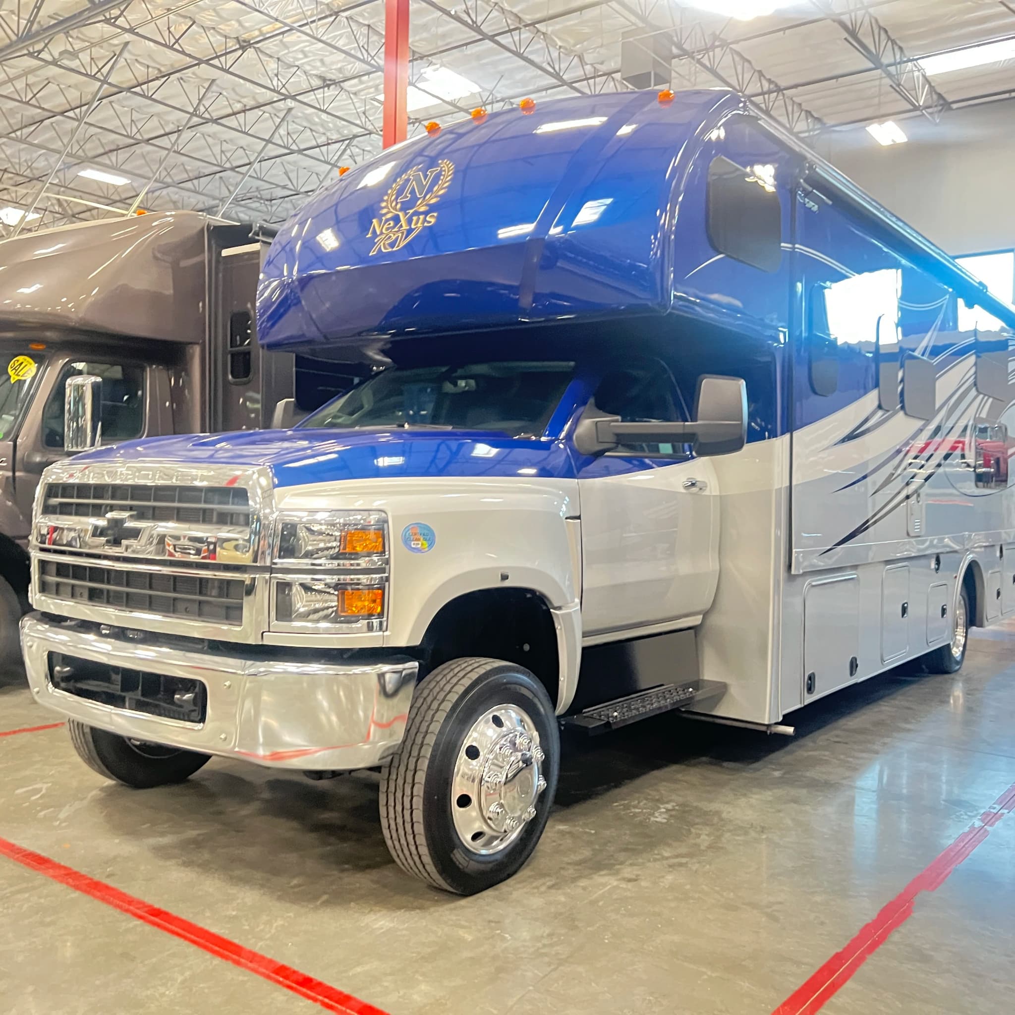 Nexus Rebel 4x4 Super C RV with custom paint — Burning Man 2026 rental with delivery to Black Rock City